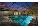 Inviting swimming pool with a screened enclosure at 3651 Country Place Blvd, Sarasota, FL 34233