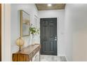 Bright entryway with a console table and globe at 3822 75Th E Ter, Sarasota, FL 34243