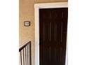 Condo unit entryway with dark brown door at 4041 Crockers Lake Blvd # 24, Sarasota, FL 34238