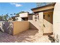 Brick paved entryway to a light tan house at 5269 Myrtle Wood Rd # 35, Sarasota, FL 34235