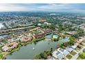 Aerial showing community, lake & pool at 5612 Ashton Lake Dr # 5612, Sarasota, FL 34231