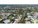 Aerial view showing home's location in a residential neighborhood at 5640 Westwind Ln, Sarasota, FL 34231