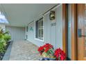 Inviting front porch with brick pavers and holiday decor at 903 20Th W Ave, Palmetto, FL 34221