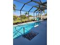 Sparkling pool with a spacious screened enclosure at 12904 49Th E Ln, Parrish, FL 34219