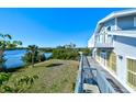 Spacious waterfront deck with scenic water views at 145 Burns Rd, Terra Ceia, FL 34250