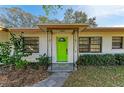 Bright green front door entryway at 1625 Bravo Dr, Clearwater, FL 33764