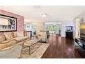 Stylish living room with hardwood floors, modern furniture, and an open layout at 1705 Shoreland Dr, Sarasota, FL 34239