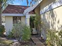 Front entrance with walkway and landscaping at 4108 Carriage Way # 6, Sarasota, FL 34241