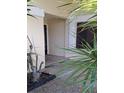 Entryway with a door and plants at 4108 Carriage Way # 6, Sarasota, FL 34241