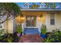 Inviting front porch with double doors and charming landscaping at 4563 Trails Dr, Sarasota, FL 34232