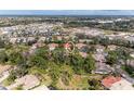 Aerial view showcasing the home's location within a community at 5613 Garden Lakes Dr, Bradenton, FL 34203