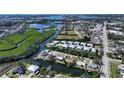 Aerial view showing home's location on a canal with water access at 603 Barnes Pkwy, Nokomis, FL 34275