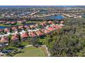 Property is situated in a beautiful neighborhood near a golf course and a lake at 735 Foggy Morn Ln, Bradenton, FL 34212