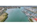 Aerial perspective of a marina with many boats and waterfront property at 250 Santa Maria St # 120, Venice, FL 34285