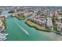 Aerial view showcasing condo location near waterways and bridges at 250 Santa Maria St # 120, Venice, FL 34285