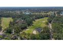 Condo community situated near a golf course and pond at 3011 Quail Holw # 3011, Sarasota, FL 34235