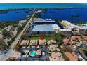 Aerial view showing home's location in a community by the water at 1152 Beachcomber Ct # 15, Osprey, FL 34229