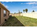 Spacious backyard with grassy lawn and privacy fence at 17741 Canopy Pl, Bradenton, FL 34211