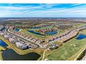 Aerial view of a golf course community with various housing styles at 18017 Gawthrop Dr # 101, Bradenton, FL 34211