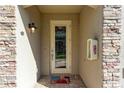 Inviting front entry with a glass door and brick facade at 18017 Gawthrop Dr # 101, Bradenton, FL 34211