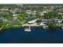 Waterfront home with private dock and pool, nestled in a quiet community at 5508 Dinah Ln, Sarasota, FL 34231