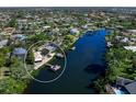 Bird's eye view of a waterfront property with private dock and pool at 5508 Dinah Ln, Sarasota, FL 34231