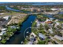 Aerial view showcasing waterfront home location and neighborhood at 5508 Dinah Ln, Sarasota, FL 34231