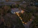 Aerial view of a house with a landscaped yard and walkway at 1021 99Th Nw St, Bradenton, FL 34209