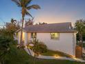 Exterior of a single-story house with a walkway and landscaping at 1021 99Th Nw St, Bradenton, FL 34209