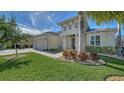 Attractive single-story home with a nicely landscaped front yard at 7087 Tamworth Pkwy, Sarasota, FL 34241