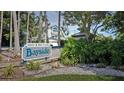 Bayside community entrance sign at Gulf & Bay Club at 1228 Siesta Bayside Dr # 1228-C, Sarasota, FL 34242
