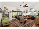 Spacious living room with hardwood floors and ample natural light at 1512 Pelican Cove Rd # 239, Sarasota, FL 34231