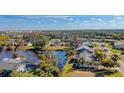 Aerial view of a waterfront home, showcasing its private backyard and serene water views at 309 South Dr, Nokomis, FL 34275