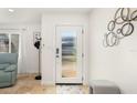 Bright and airy entryway with a glass front door at 355 N Washington Dr, Sarasota, FL 34236