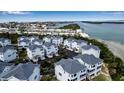 Aerial perspective of a coastal community near the water at 821 Evergreen Way, Longboat Key, FL 34228