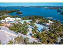 Wide aerial view of property, showing house and large lot at 18 N Casey Key Rd, Osprey, FL 34229