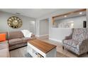Living room featuring comfortable seating and a view of the kitchen at 2202 Hyde Park St, Sarasota, FL 34239