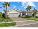 Stunning curb appeal! Two story home with a two car garage, and nicely landscaped lawn at 3314 Chestertown Loop, Bradenton, FL 34211