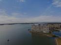 Condo building on a peninsula with water views and boat at 4775 Cove Cir # 202, St Petersburg, FL 33708