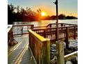 Wooden dock with sunset view, for renters only at 108 1St Ave, Venice, FL 34285