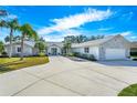 Stunning curb appeal with modern stone facade and landscaping at 3520 Wilderness W Blvd, Parrish, FL 34219