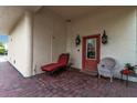 Relaxing patio with seating and brick pavers at 6442 Mourning Dove Dr # 6442, Bradenton, FL 34210