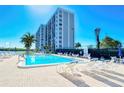 Enjoy this beautiful outdoor pool with waterfront views at 9397 Midnight Pass Rd # 603, Sarasota, FL 34242