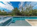 Stunning pool with a spa, perfect for relaxation and entertaining at 115 Los Cedros Dr, Anna Maria, FL 34216