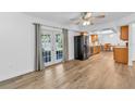Spacious kitchen with wood cabinets, granite countertops, and stainless steel appliances at 17402 Billiar Ave, Port Charlotte, FL 33948