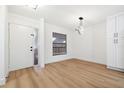 Bright dining area with hardwood floors and modern chandelier at 2321 Beneva Ter # 2288, Sarasota, FL 34232