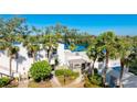 Condo community with waterfront access and tropical landscaping at 307 Timberlake Dr # 307, Bradenton, FL 34210