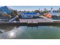 Property with covered roof and private dock at 526 67Th St, Holmes Beach, FL 34217