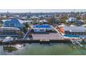 House needing roof repair, located on the water at 526 67Th St, Holmes Beach, FL 34217