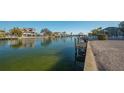 Private dock and boat access on a calm waterway at 526 67Th St, Holmes Beach, FL 34217